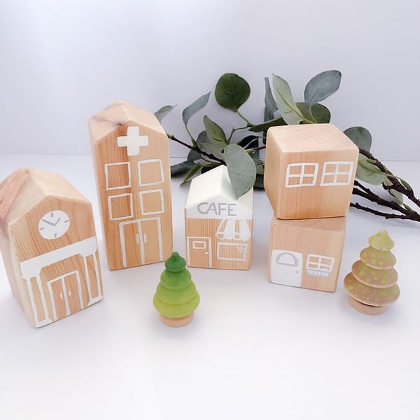 Set of 7 wooden buildings and trees making up the My Little Town Wooden Play Set